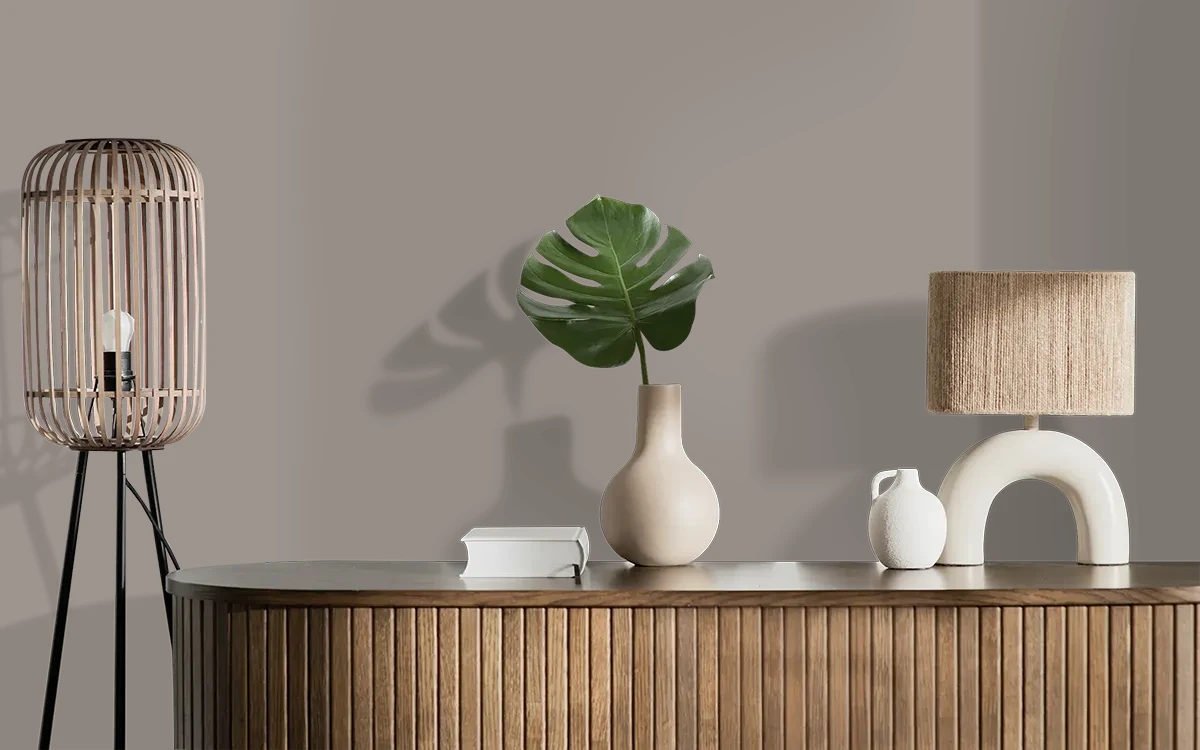 Nippon Paint's STONE TOWER color on different wall surfaces.