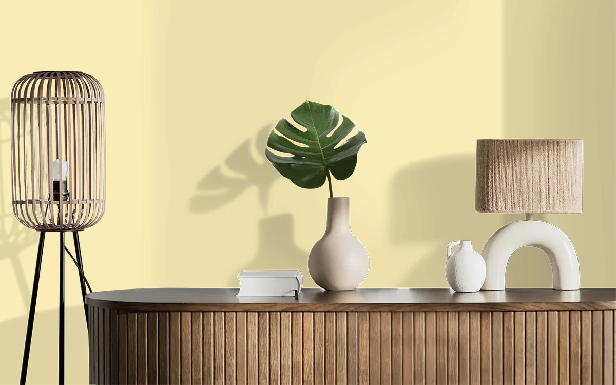 Nippon Paint's SUNDAY MORNING color on different wall surfaces.
