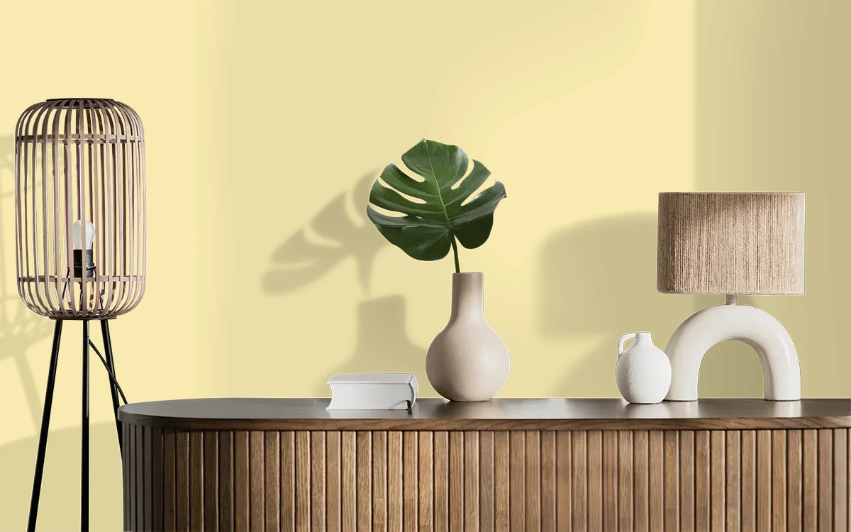 Nippon Paint's SUNNY IVORY color on different wall surfaces.