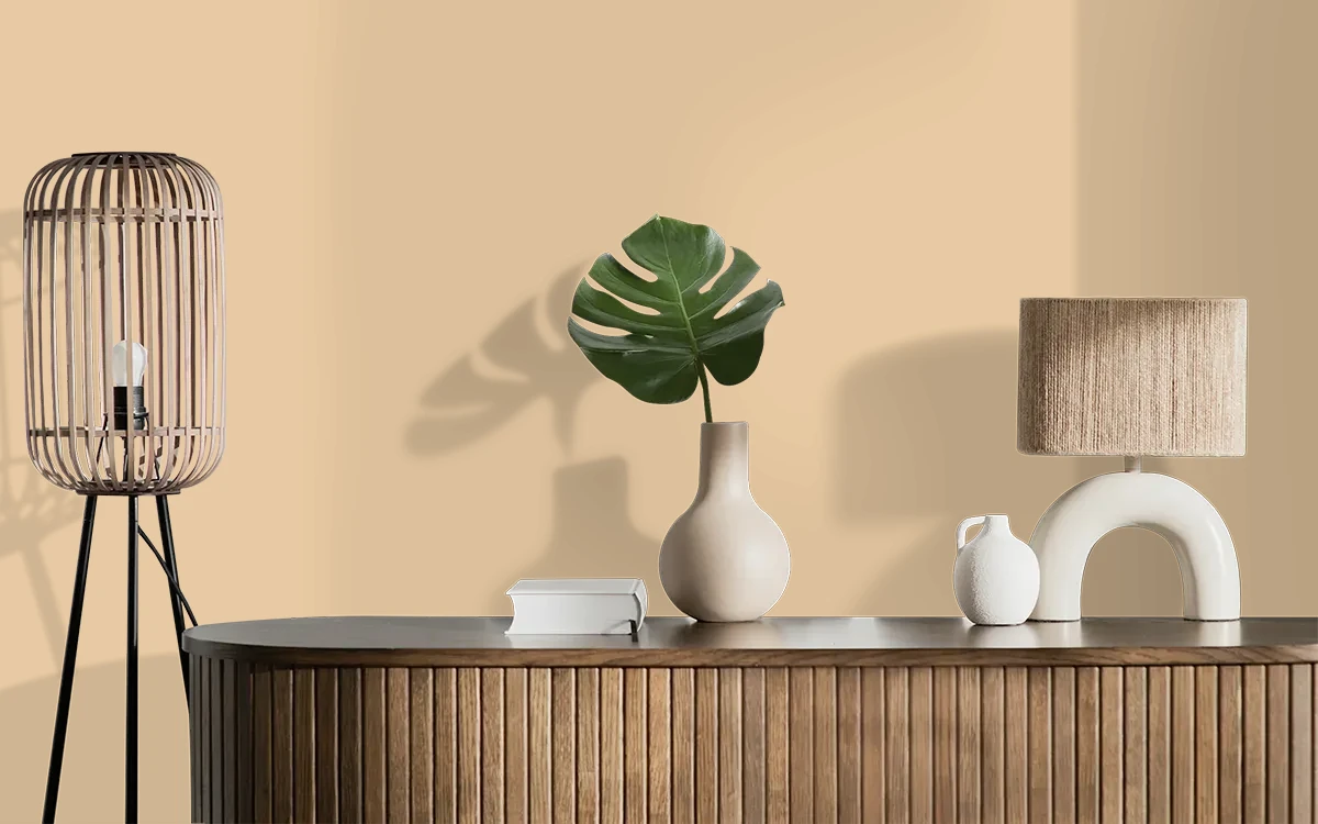 Nippon Paint's SUNSTRAW color on different wall surfaces.