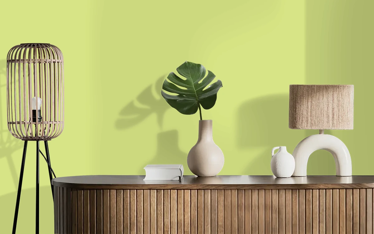 Nippon Paint's SWEET BERGAMOT color on different wall surfaces.