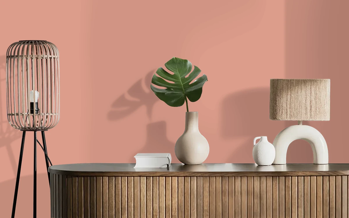 Nippon Paint's SWEETHEART SCARLET color on different wall surfaces.
