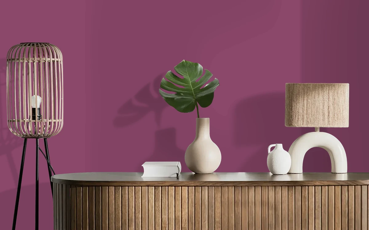 Nippon Paint's SWELTERING PINK color on different wall surfaces.
