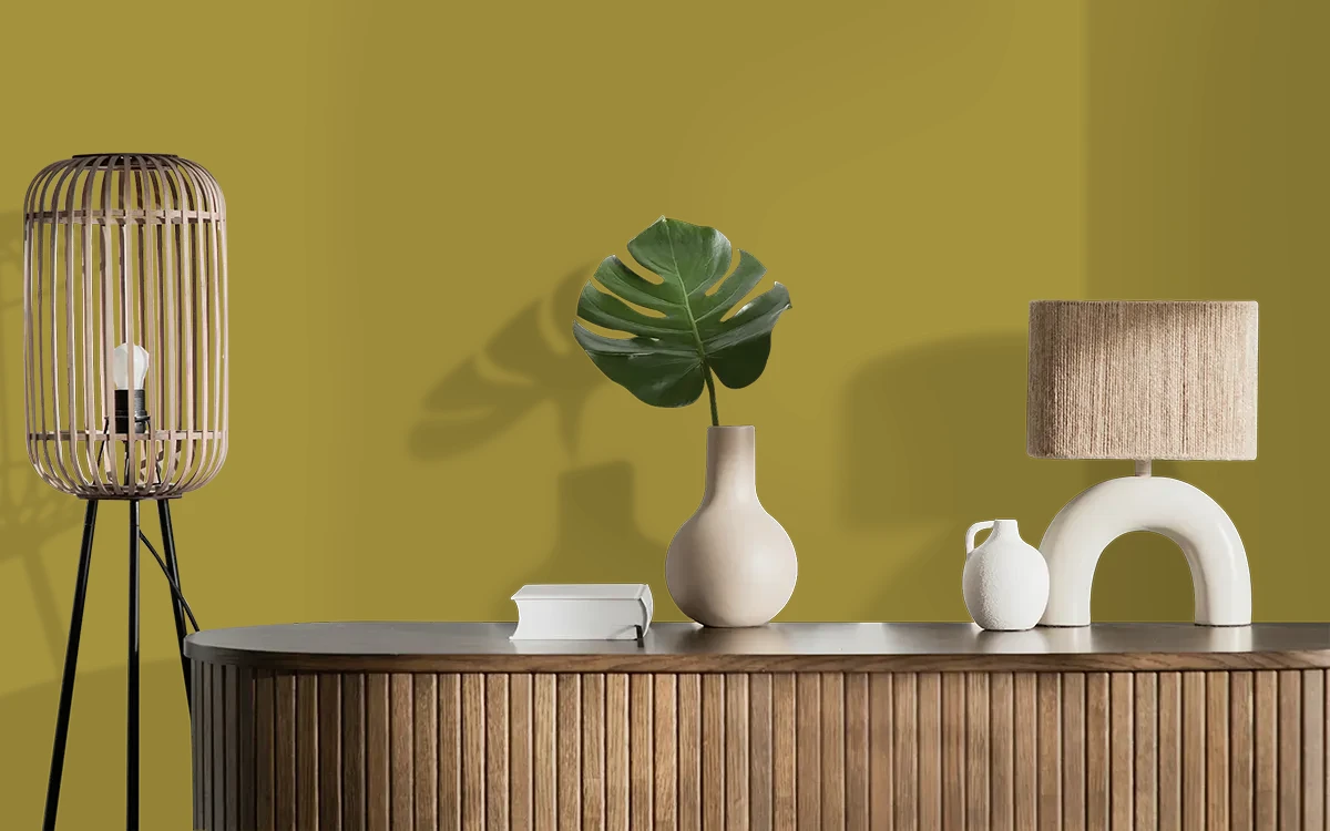 Nippon Paint's SWINGING PALMS color on different wall surfaces.