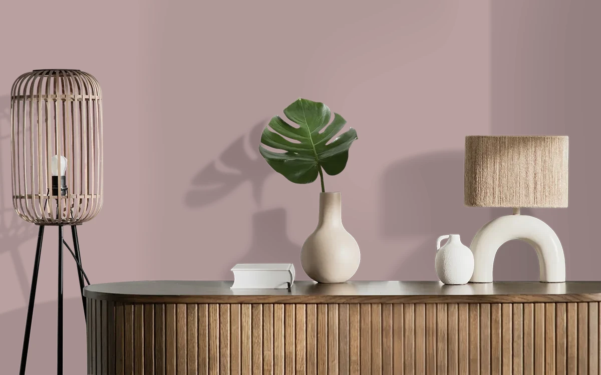 Nippon Paint's TEABERRY GRAY color on different wall surfaces.