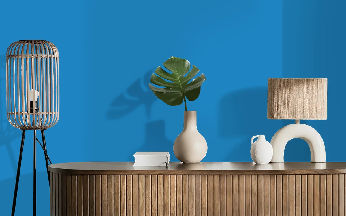 Nippon Paint's TRUE BLUE color on different wall surfaces.
