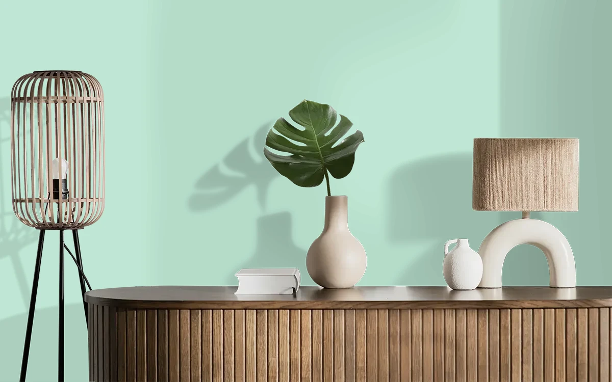Nippon Paint's WALK IN THE PARK color on different wall surfaces.