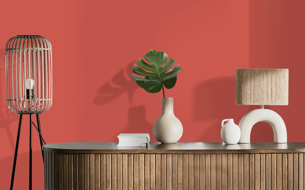 Nippon Paint's WATERMELON LOLLY color on different wall surfaces.