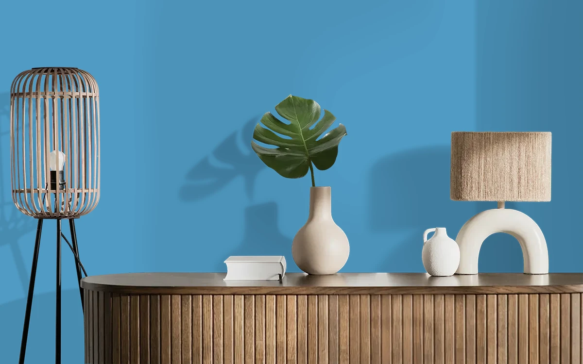 Nippon Paint's WILLY'S TRAVEL color on different wall surfaces.