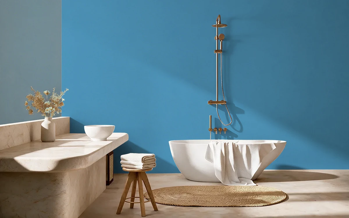 Nippon Paint's WILLY'S TRAVEL color on different wall surfaces.