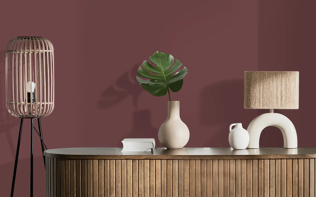 Nippon Paint's WINESTONE color on different wall surfaces.