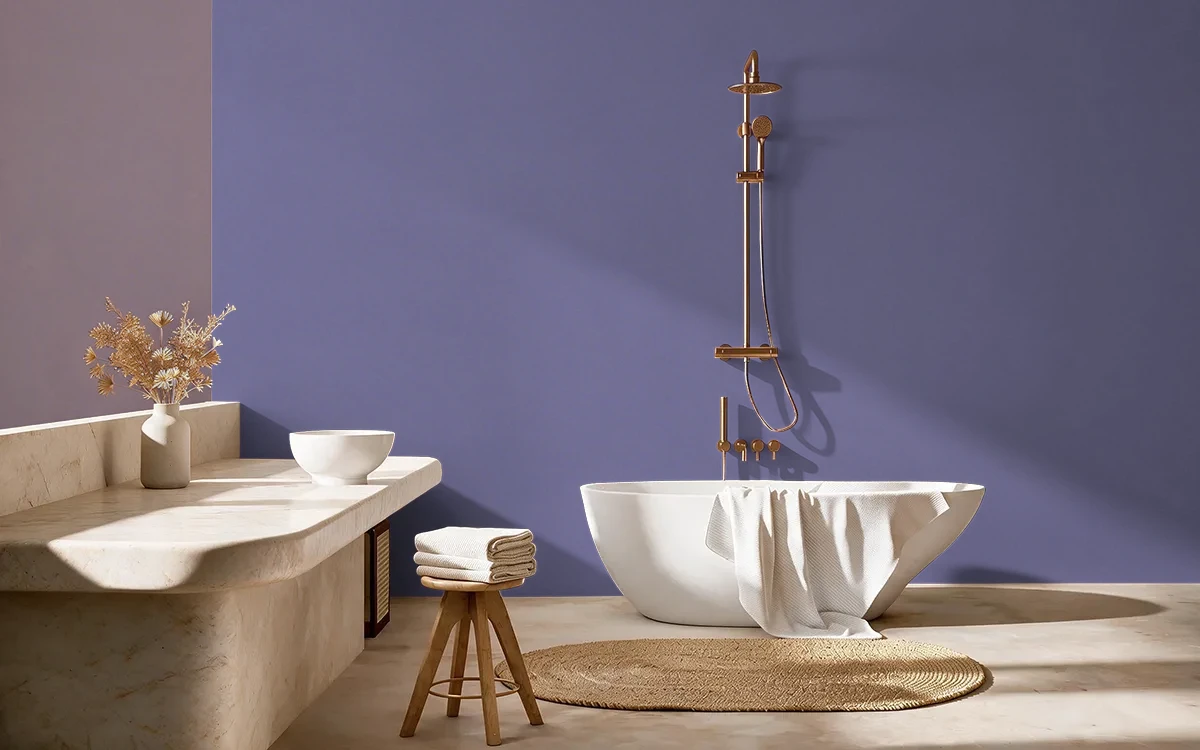 Nippon Paint's WISHFUL PURPLE color on different wall surfaces.