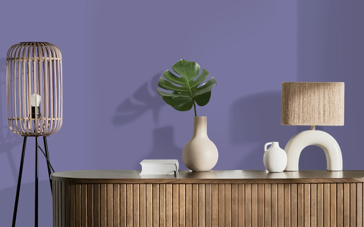 Nippon Paint's WISHFUL PURPLE color on different wall surfaces.