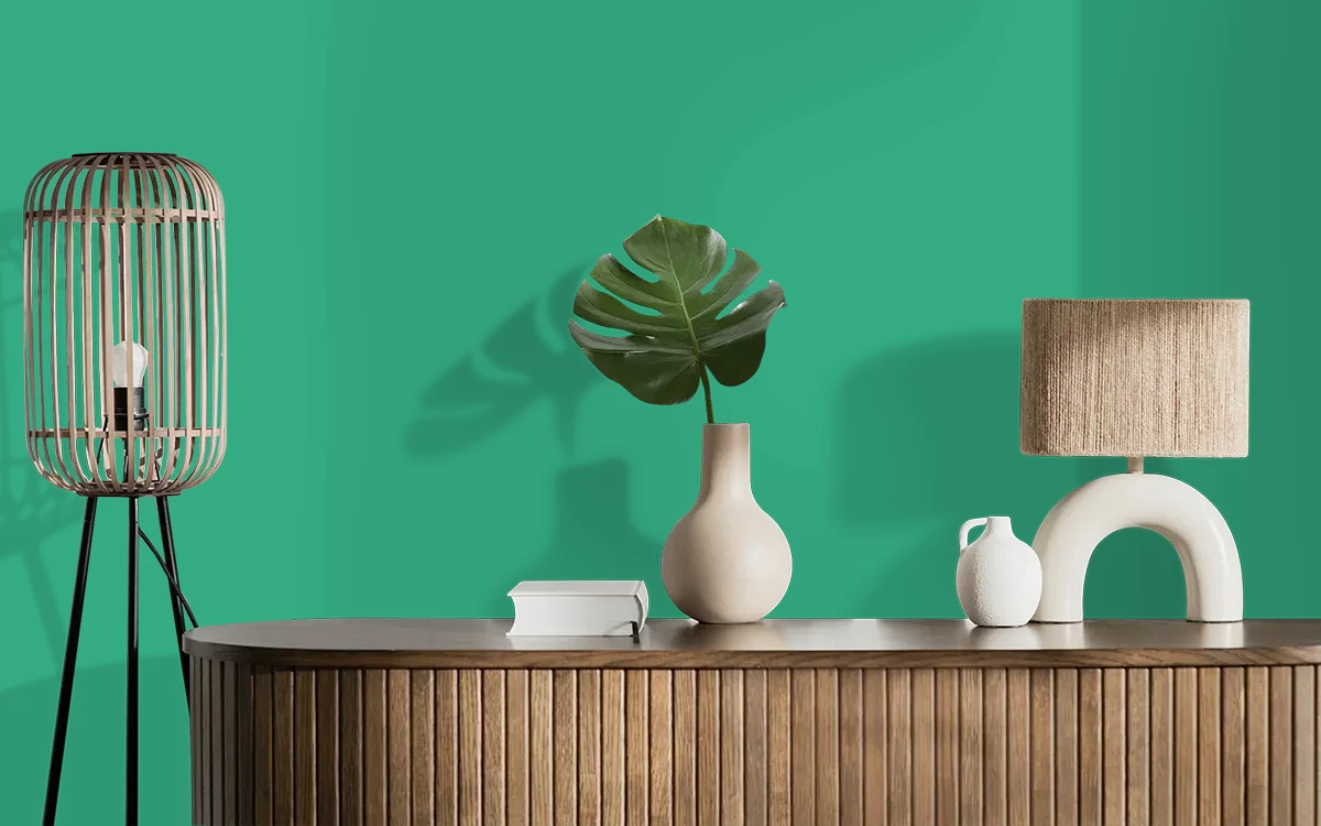 Nippon Paint's WIZARD GREEN color on different wall surfaces.