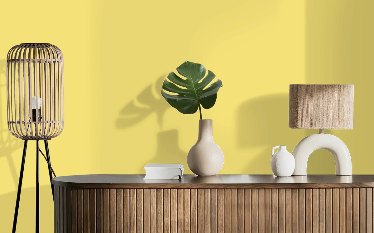 Nippon Paint's YELLOW PENDANT color on different wall surfaces.
