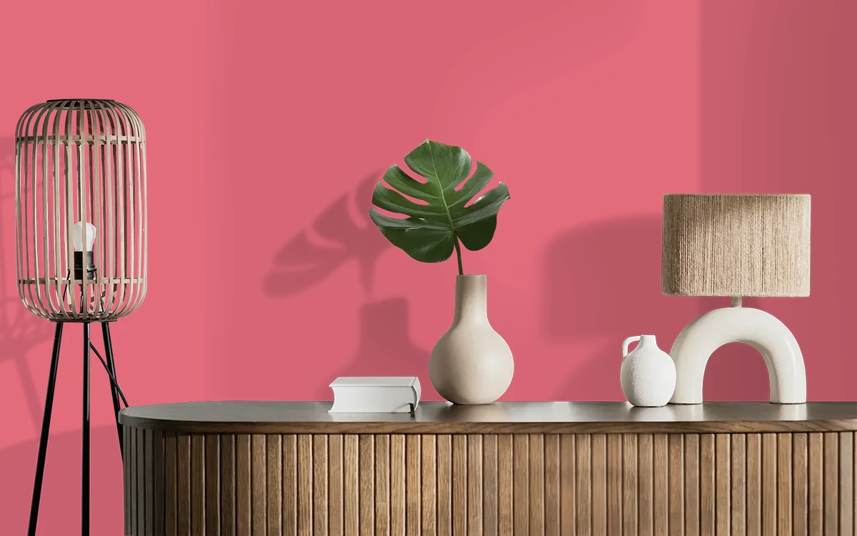 Nippon Paint's ZINNIA SCARLET color on different wall surfaces.